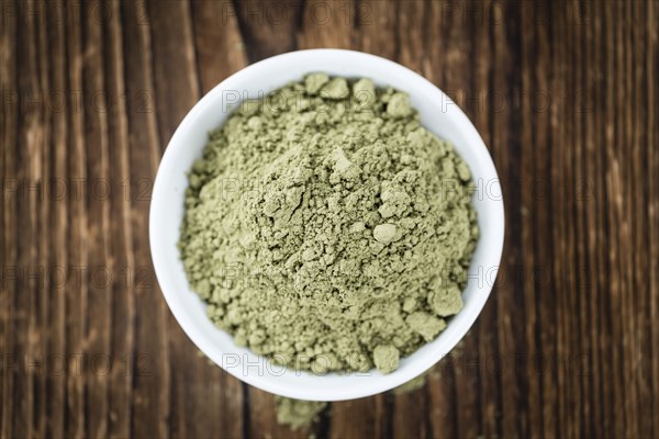 Stevia Powder on an old wooden table (close-up shot)