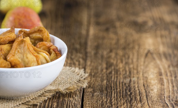Bowl with dried Pears (close-up shot, selective focus)