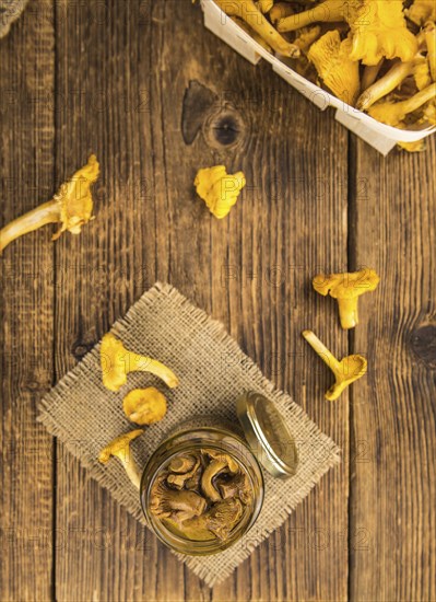 Portion of fresh Canned chanterelles close-up shot, selective focus