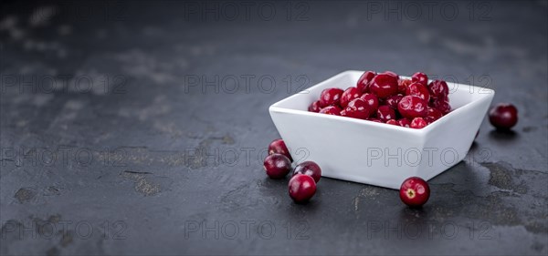 Portion of Preserved Cranberries as detailed close-up shot, selective focus