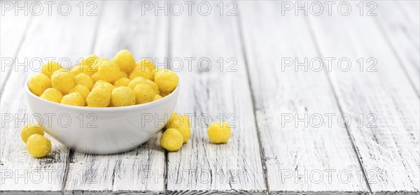 Portion of fresh made Cheese Balls (close-up shot, selective focus)