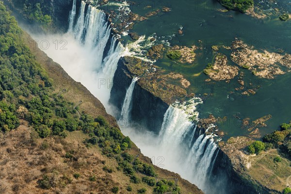 Victoria Falls at drought near Livingstone, Zimbabwe, as aerial shot made from a helicopter, Africa