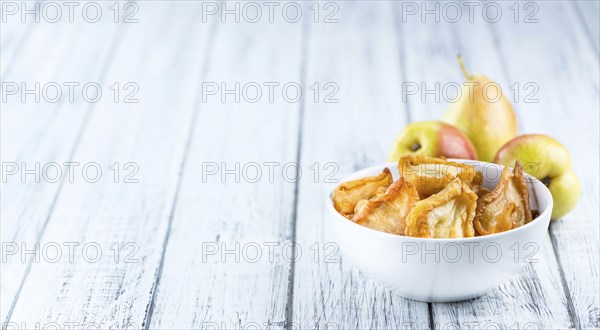 Dried Pears (selective focus) on an old wooden table