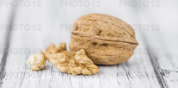 Portion of fresh Walnuts (close-up shot, selective focus)