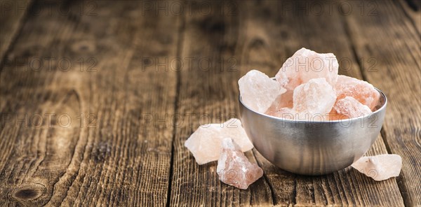 Portion of pink himalayan Salt (detailed close-up shot, selective focus)