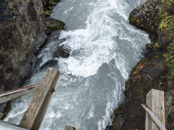 Hraunfossar waterfall in western Iceland at a cloudy day