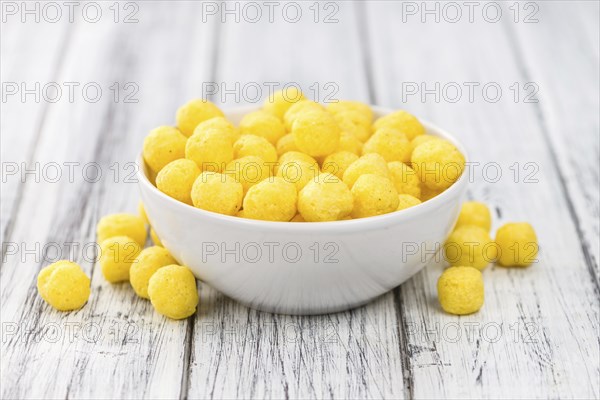 Portion of fresh made Cheese Balls (close-up shot, selective focus)