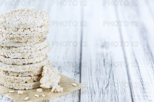 Some Rice Cakes (close-up shot) on an old wooden table