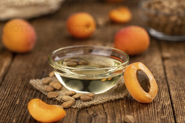 Some Apricot Kernel Oil as detailed close up shot (selective focus)