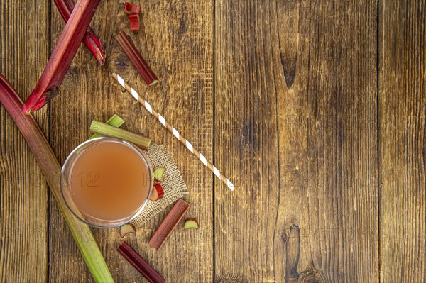 Portion of fresh made Rhubarb Juice (close up shot, selective focus)