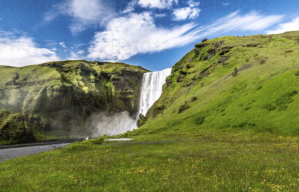 Spectacular Skogafoss Waterfall in southern Iceland during a summer day