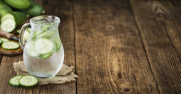 Homemade Cucumber Water on vintage background selective focus, close-up shot
