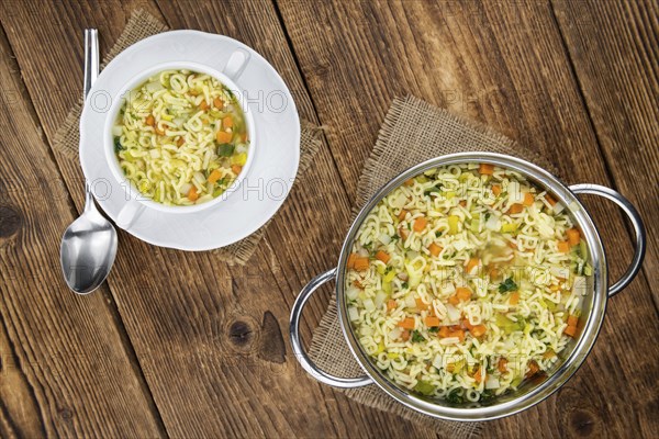 Portion of homemade Alphabet Soup (selective focus, close-up shot)