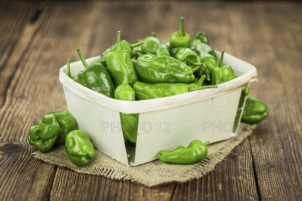 Portion of fresh Raw Pimientos close-up shot, selective focus