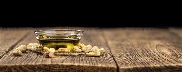 Portion of Cashew Oil (detailed close up shot, selective focus)