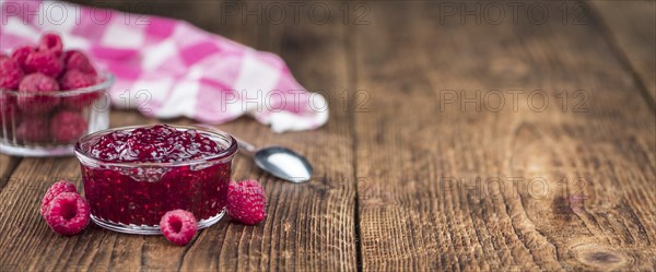 Some homemade Raspberry Jam as detailed close-up shot, selective focus
