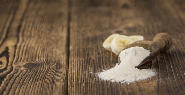 Banana Powder on a vintage background as detailed close-up shot, selective focus