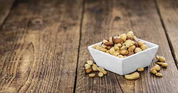 Portion of roasted nuts as detailed close up shot (selective focus)