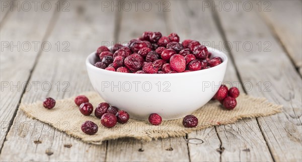 Portion of healthy Dried Cranberries (selective focus, close-up shot)
