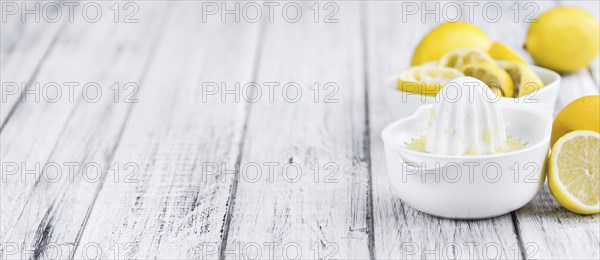 Fresh made Juice (lemon) on a vintage background (close-up shot)