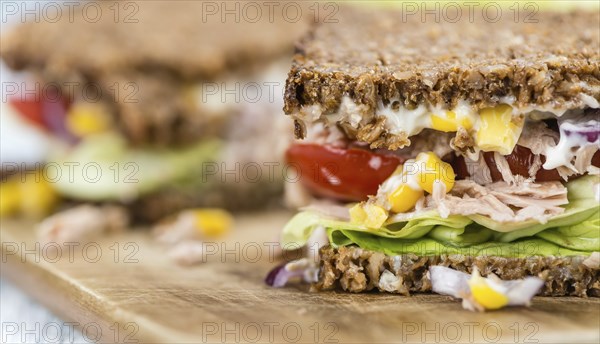 Tuna sandwich with wholemeal bread (selective focus, close-up shot)
