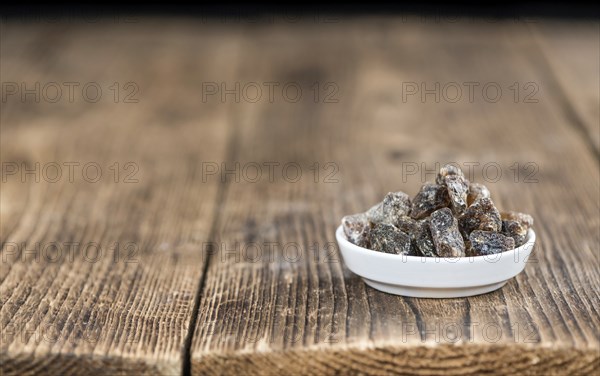 Portion of brown Rock Candy as detailed close-up shot (selective focus)