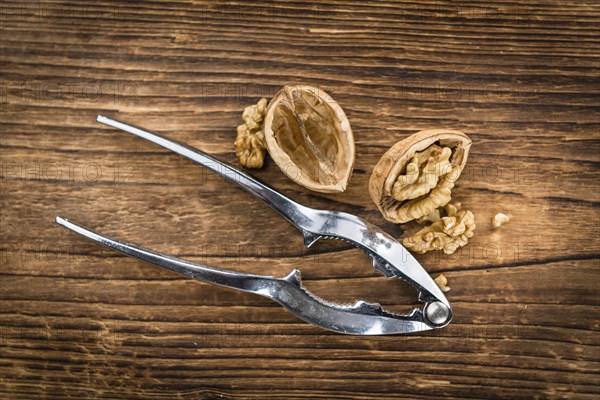 Walnuts on a vintage background as detailed close-up shot (selective focus)