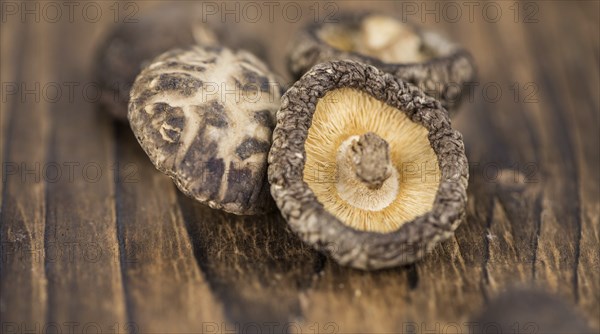 Some homemade Shiitake mushrooms (dried) as detailed close-up shot, selective focus