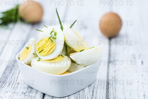 Portion of halved Eggs as detailed close-up shot (selective focus)