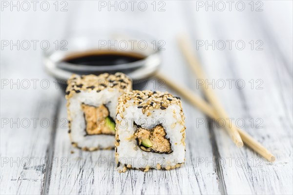 Portion of fresh made Sushi (detailed close-up shot, selective focus)