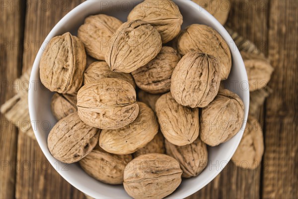 Portion of fresh Walnuts (close-up shot, selective focus)