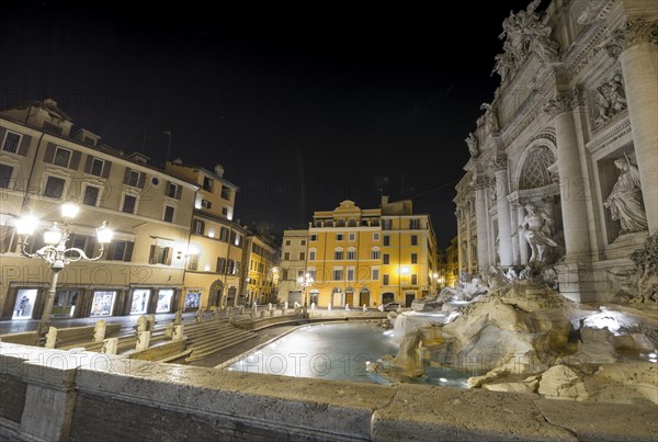 Beautiful Trevi Fountain and Building at Night in City of Rome, Lazio, Italy, Europe