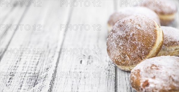 Portion of Berliner Doughnuts as detailed close-up shot, selective focus