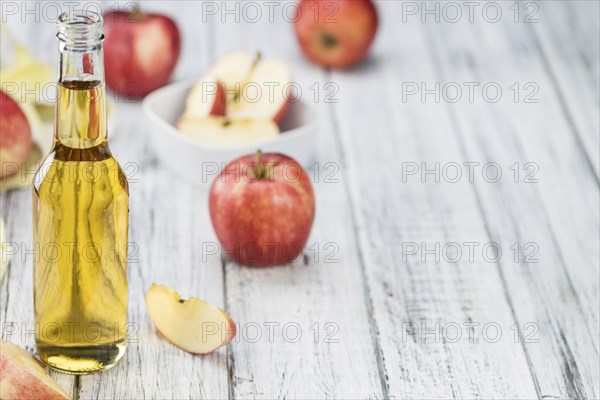 Apple Cider on a vintage background as detailed close-up shot (selective focus)