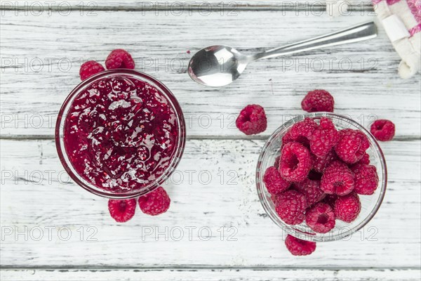 Some homemade Raspberry Jam as detailed close-up shot, selective focus
