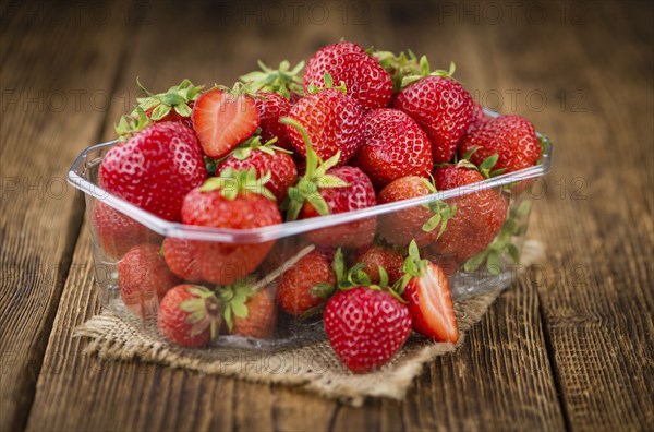 Portion of fresh Strawberries close-up shot, selective focus