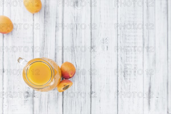 Some homemade Apricot Juice (selective focus) as detailed close-up shot