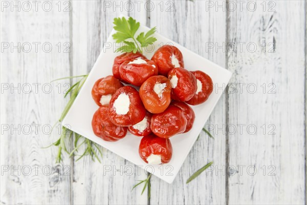 Some homemade Red Pepper (stuffed with cheese) (selective focus) as detailed close-up shot