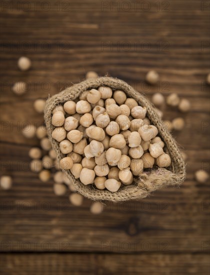 Portion of fresh Chickpeas close-up shot, selective focus