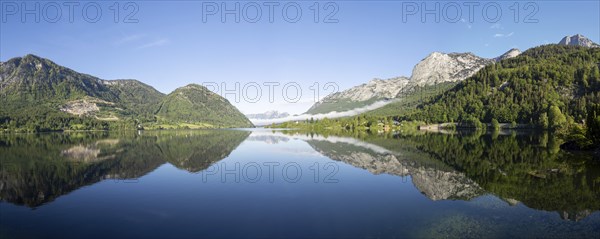 Morning atmosphere, reflection, early morning fog over the Grundlsee, panoramic shot,