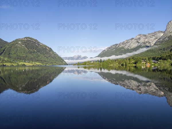 Morning atmosphere, reflection, early morning fog over the Grundlsee, panoramic shot,
