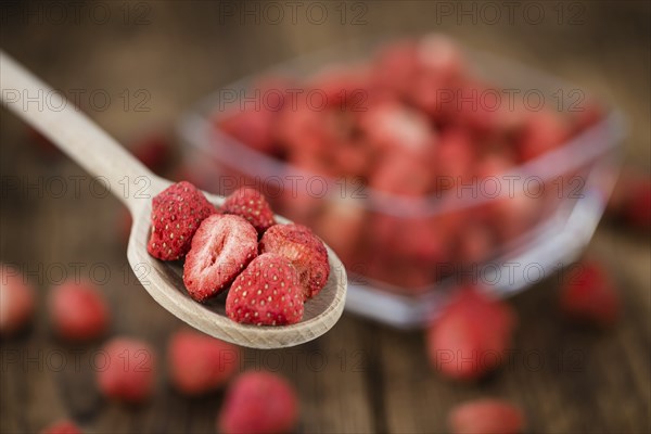 Dried Strawberries on a vintage background as detailed close-up shot, selective focus