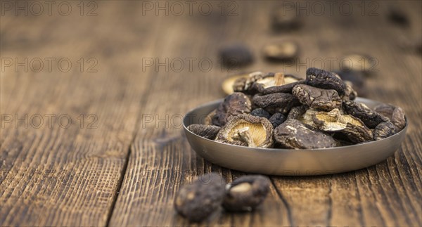 Some homemade Shiitake mushrooms (dried) as detailed close-up shot, selective focus