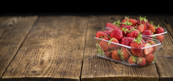 Portion of fresh Strawberries close-up shot, selective focus