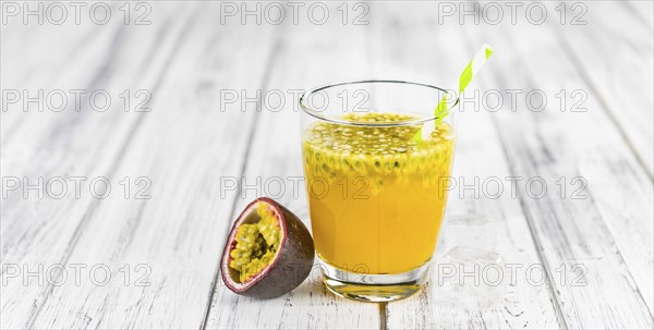 Some healthy Maracuja Juice (selective focus, close-up shot)