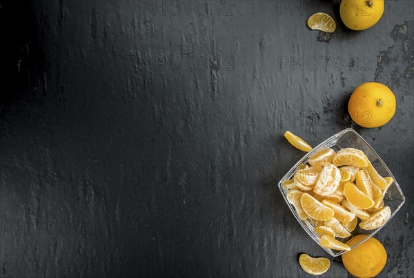 Portion of tangerines (close-up shot) on a vintage background (selective focus)