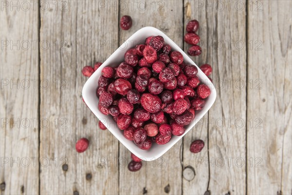 Portion of healthy Dried Cranberries (selective focus, close-up shot)