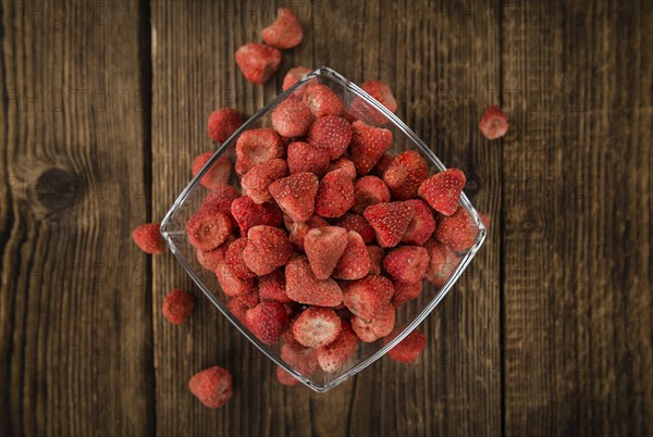 Dried Strawberries on a vintage background as detailed close-up shot, selective focus