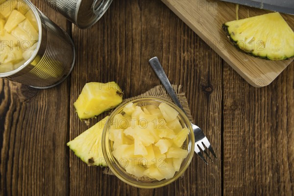 Portion of fresh Preserved Pineapple pieces close-up shot, selective focus