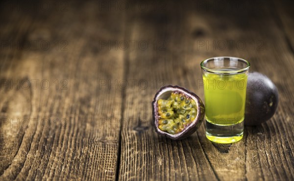 Passion Fruit Liqueur as detailed close-up shot, selective focus